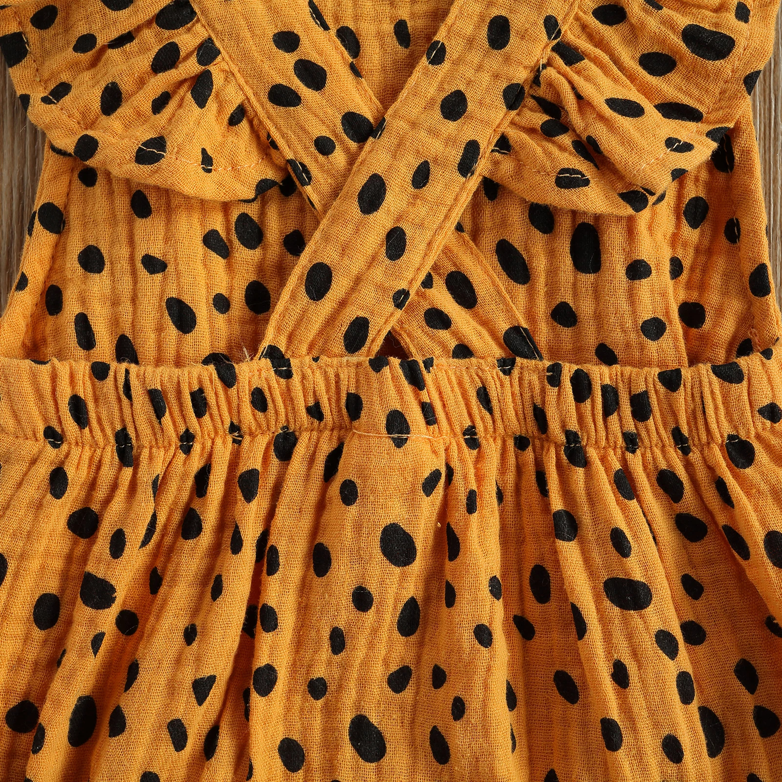 Black polka mustard romper with matching headband - Image 5