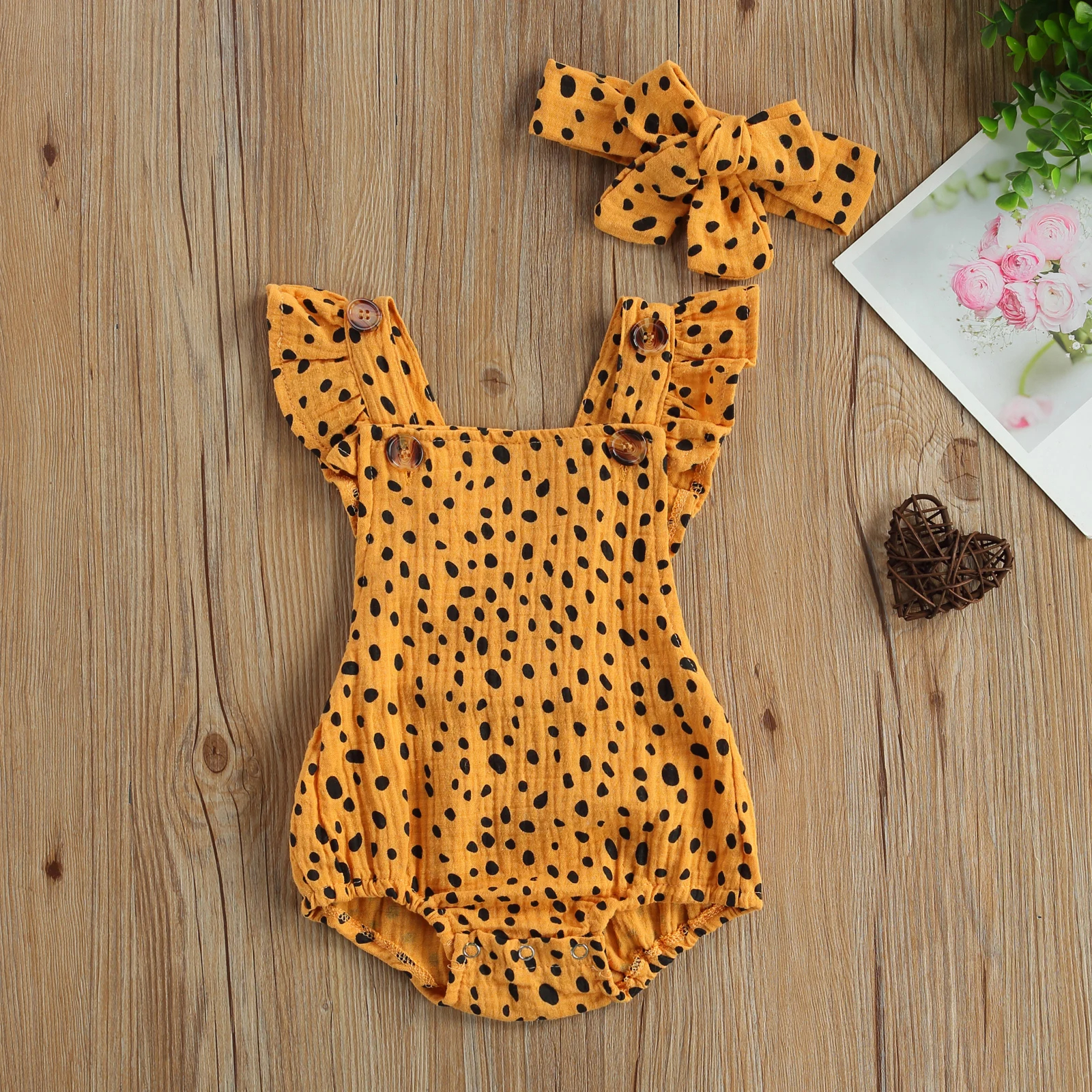 Black polka mustard romper with matching headband - Image 2