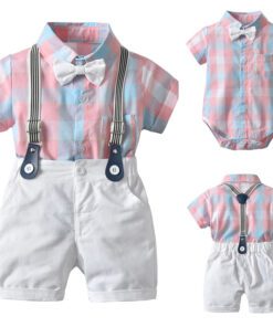 Pink blue plaid shirt with white shorts and suspenders