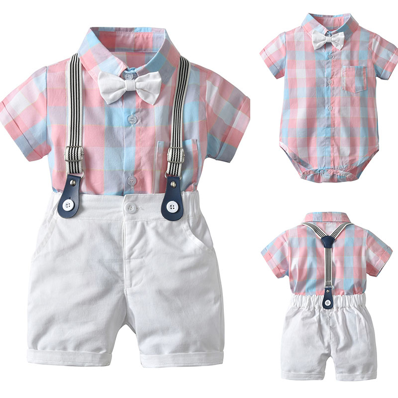 Pink blue plaid shirt with white shorts and suspenders