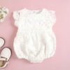 White lace romper with silk ribbon tie